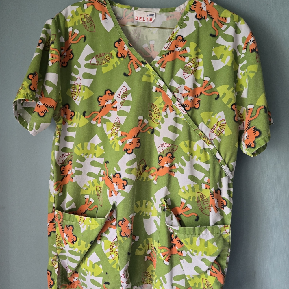 Delta Green and Orange Tiger Print Scrub Top